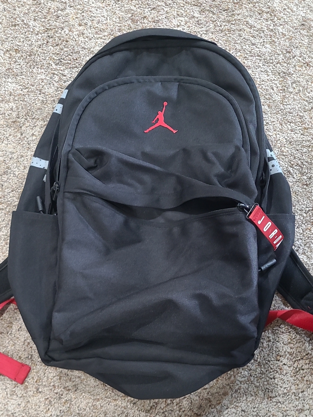 Jordan Black Backpack with Red Jumpman Accent